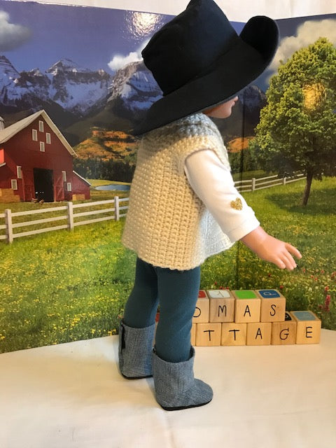 AG96 - Cream vest, denim pants, denim boots and wide brimmed hat